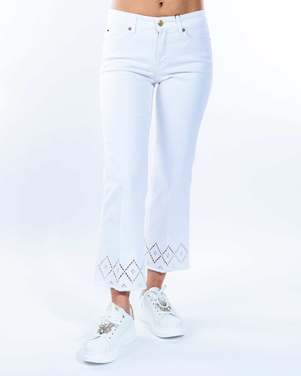 Pantalón tejano bootcut blanco con detalle bajos